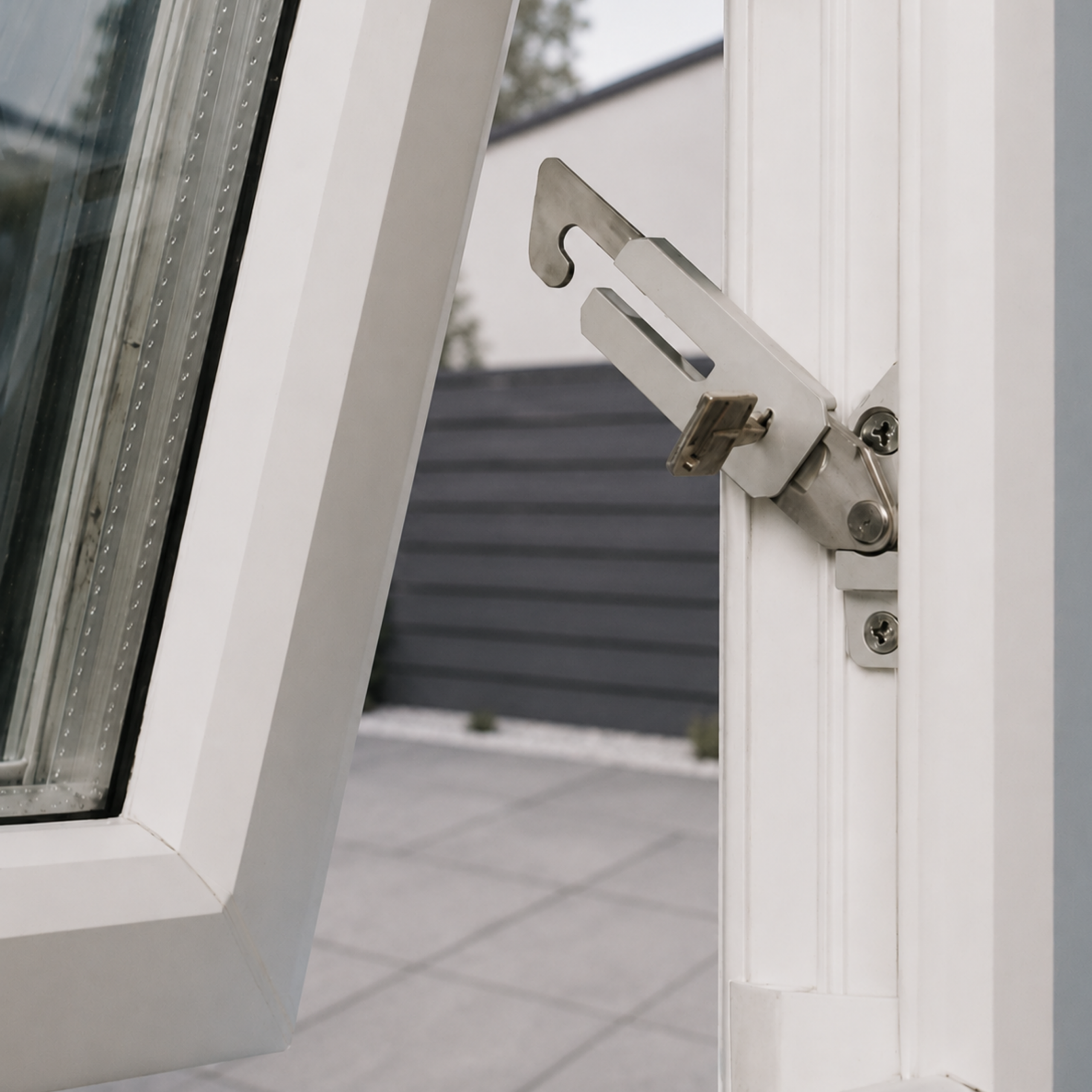 IMAGE OF RES-LOK CONCEALED RESTRICTOR ON A WINDOW